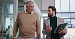 Tablet, talking and walking with business men in office together for planning or review. App, conversation or feedback with manager and employee in corporate workplace for collaboration or update