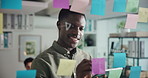 Writing, glass and black man with sticky note for tablet, project management or solution in office. Creative agency, thinking and worker with mind map for business strategy, ideas or brainstorming