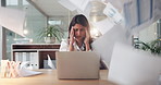 Woman, headache and chaos at office with paper falling, stress or overwhelmed with financial crisis. Person, accountant and migraine with laptop, pain or frustrated with paperwork for audit at agency