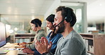 Fist pump, call center and man in office on computer for telemarketing, sales target and success. Applause, coworking and workers celebrate for lead generation bonus, customer service and consulting