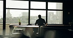 Arrive, boardroom and coffee with business man in office, getting ready for start of meeting. Back, view of city and window with employee walking to seat in workplace for seminar or workshop