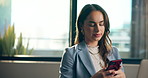 Phone, networking and businesswoman in office with online communication, connectivity or chatting. Serious, cellphone and female corporate employee with email contact on mobile app in workplace.