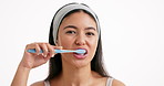 Face, brushing teeth and woman in studio, health and dental hygiene on white background. Mockup space, dentist tips or person with oral care, whitening or fresh breath with wellness or cleaning mouth