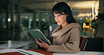 Business, woman and reading on tablet in office at night for research, editor feedback and proofreading. Journalist, digital and review newsletter, fact check and information for publication deadline