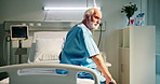Thinking, sick and senior man in hospital, cancer and illness with emotion, contemplation and sad. Mature person, patient and healthcare facility with stress, anxiety and chronic disease with virus
