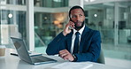 Business, black man and listen with phone call in office for discussion, finance report and schedule. Accountant, laptop and talk for financial pitch, contact client and chat for investment proposal