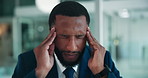 African businessman, headache and stress at office with temple massage for burnout at insurance agency. Person, migraine and risk management consultant with pain, fatigue and exhausted at company