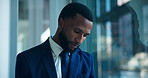 Black man, sad and thinking by window at office with bankruptcy, mistake and decision at company. African business person, depression and perspective with mental health, stress or financial crisis