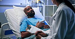 Hospital bed, man or talking to doctor with clipboard for treatment plan, chest pain symptoms or night. Health, patient and expert with checklist in clinic for medical progress, feedback or follow up