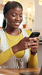 Smile, black woman and typing with phone at house for research, social media and texting contact. Female person, mobile and chat for communication, surfing internet and message with notification 