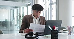 Businessman, documents or laptop with chart for digital marketing, information or process in office. Man, employee or research with paperwork on computer for online startup or business in workplace