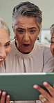 Senior friends, tablet and surprise in home for funny online drama, social media meme or bonding. Retirement, shock and women laughing with tech in house for comedy video, reunion visit or connection