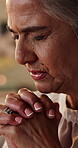 Senior woman, talk and praying at house for faith, devotion and worship God for guidance. Elderly person, bokeh and spiritual prayer to Jesus christ for belief, Christian religion and holy confession