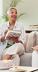 Book club, friends or senior women with discussion, home or bonding together with literature. Pensioner, reading group or mature people in lounge, hobby or review for novel, conversation or knowledge