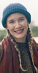 Happy, nature and face of woman on vacation, holiday or getaway with positive attitude. Smile, laugh and portrait of female person from Australia on weekend trip outdoor with relax on break in winter