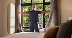 Back, open curtain and woman at window for wake up, morning reflection and weekend getaway at hotel. Thinking, female person and drapes in bedroom with holiday view, calm thoughts and contemplation.