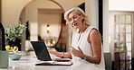 Laptop, remote work and mature woman on video call with accounting paper, finance or talk. Computer, freelance auditor and online meeting for budget report, virtual webinar and bokeh in home kitchen