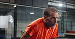 Tennis, senior man or tired on court with breathing, intense workout or match recovery. Retirement hobby, elderly person or exhausted at indoor padel club with training fatigue, fitness or game break