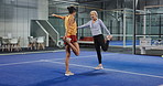 Padel, women and team stretching for sports, training preparation or shoulder workout at court. Tennis, mature people and friends warm up legs to get ready for match, fitness or practice for exercise