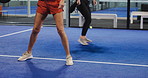 Tennis team, legs and playing on court for match competition, tournament practice or workout. Fitness, padel doubles and women with racket at health club for sports challenge, exercise or performance