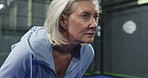 Padel, tennis and mature woman on court for training, match and practice game in sports club. Fitness, exercise and person waiting to serve with racket for challenge, tournament and competition
