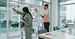 Glass wall, brainstorming and business people in office with discussion for creative project together. Meeting, board and team of magazine editors working on article for publishing in collaboration.
