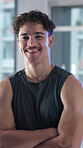 Face, laughing and man with arms crossed, gym or confident for workout goals, happiness and wellness. Health club, membership and person with sportswear for fitness, athlete and determined in USA