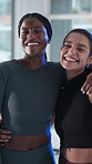 Face, friends and women in gym, hug and excited for fitness, personal trainer and happiness on break. Laughing, people and embrace in health club, instructor and smile for workout goals or routine