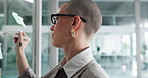 Glass wall, business and woman in office, writing and content strategy for brand marketing. Person, public relations and employee in workplace, board and ideas for subscription growth and media info