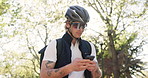 Phone, cyclist and man outdoor for delivery, location navigation and direction with flare. Mobile, courier and rider with app for logistics service, ecommerce or search for travel destination at park