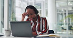 Stress, laptop and black woman in office with call center, crm or communication for online client. Headset, computer and African female technical support agent with customer service in workplace.