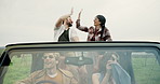 High five, travel and people with smile, driving and summer holiday with transportation. Friends, men and women with car, vacation and excited with weekend break, journey and road trip in Canada