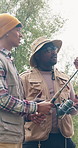 Fishing, talking and travel with friends outdoor for adventure, casting advice or bonding. Fisherman season, reel gear discussion and camping vacation with group of people in nature for rod equipment
