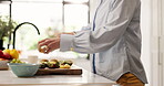 Chopping, fruit salad and hands of woman in kitchen of home for diet, health or nutrition. Breakfast, cooking and food with person cutting at counter in apartment for natural or organic meal prep