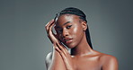 Skincare, beauty and face of black woman on gray background for wellness, health and glowing skin. Dermatology, African model and portrait of girl for cosmetics, aesthetic and pride on mockup space