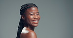 Skincare, laugh and face of black woman in studio with health, beauty and facial glow. Happy, mock up space and portrait of African female person with dermatology for cosmetics by gray background.