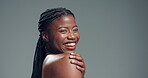 Laugh, smile and beauty with face of black woman in studio for self care, skincare and shine. Dermatology, mockup space and hydration glow with person on background for clear skin and collagen