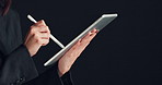 Business, tablet and woman in studio, hands and financial analytics on dark background. Person, investor and employee with stylus, economy stats or email with finance information, internet or network