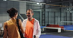 Fitness, people and handshake on court for padel tournament, game or sportsmanship. Athletes, mature man and woman with conversation at health club for friendly match, competition or challenge