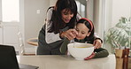 Happy mom, child and baking with bowl in kitchen for dessert, meal prep or pancake mix in home. Mother, help and daughter stir with spoon for junior baker, learning or childhood development in house