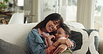Happy, hug and mom with child on sofa for bonding, relationship and affection in home. Family, parent and mother with girl embrace for security, support and love on couch for comfort in living room