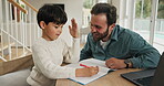 Studying, high five and father with child in home, teaching problem solving or correct solution. Math homework, man and boy celebrate with laptop for learning, education support and counting practice