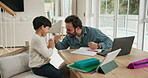 Studying, high five and father with son in family home, teaching problem solving and find correct solution. Math homework, man and child excited with tech for learning, education support and winning.