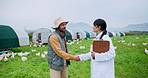 Clipboard, handshake or poultry with farmer and vet outdoor in countryside for meeting or welcome. Agriculture, chicken or sustainability with man and woman shaking hands on farm for animal health