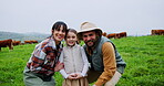 Portrait, parents and child on farm with smile, agriculture and bonding together with cattle. Happy, relax and family in countryside with cows, support and fresh air for childhood development.