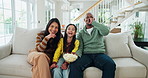 Face, watching tv and family laugh with popcorn in home for comedy movie, show or film with parents. Television, mother and father with kid, food or interracial people streaming funny series together