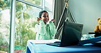 Girl, excited and video call with laptop in home for online tutoring, education and knowledge. Kid, elearning and smile for study, achievement and celebration with virtual class for child development