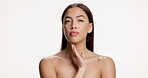 Face, woman and touch for skincare in studio with beauty, clear skin and collagen for natural glow. Portrait, person and mockup space for dermatology, facial results and self care on white background