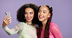 Selfie, pout and girl friends in studio with makeup, self care and facial cosmetology together. Connection, phone and women with beauty for photography picture with bonding by purple background.