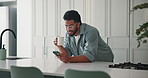 Coffee, smile and man in kitchen with phone, typing and social media or internet and texting. Reading, person and warm beverage with communication, connection or message for online dating or chatting
